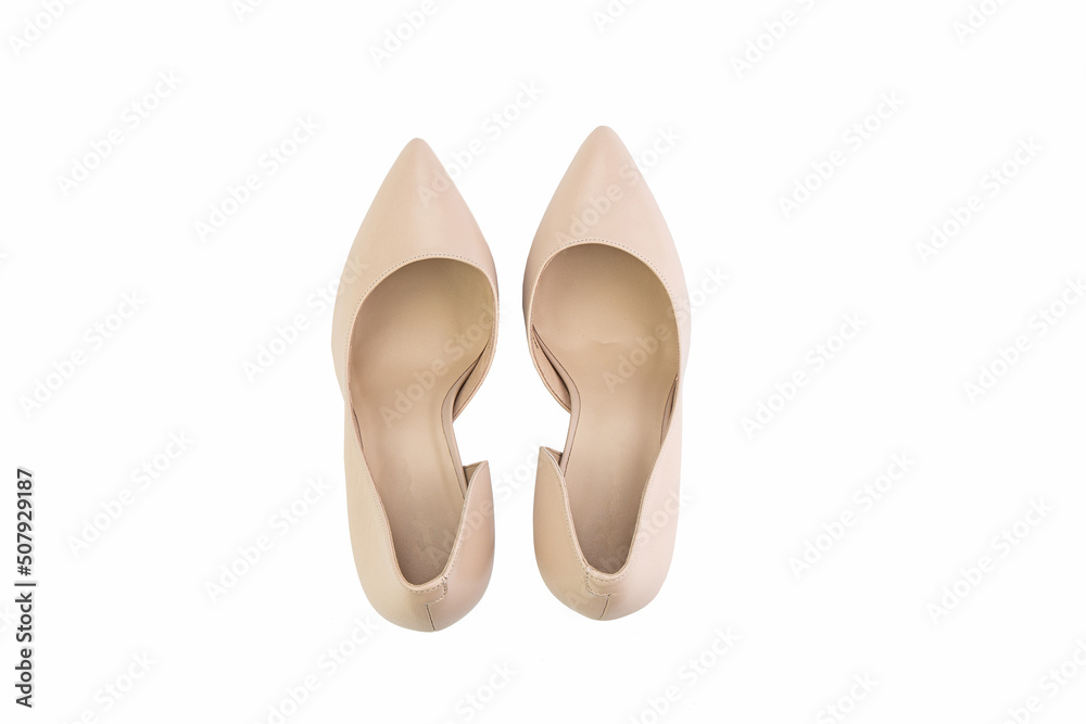 Classic and elegant high-heeled women shoes. Isolated object close up on white background. Top view. Fashion shoes.