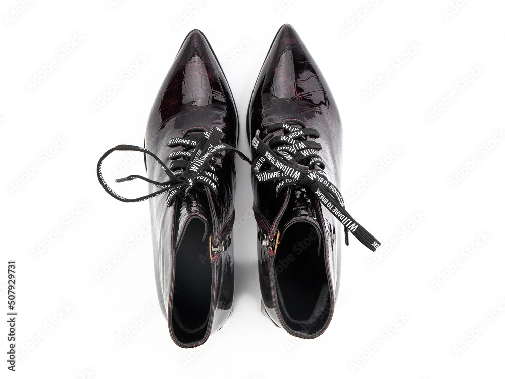 black leather jodhpur boots isolated on white background. Top view. Fashion shoes. Photoshoot for shoe shop concept.