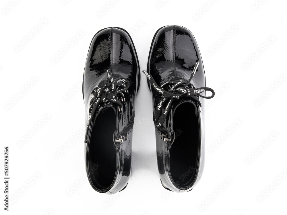 black leather jodhpur boots isolated on white background. Top view. Fashion shoes. Photoshoot for shoe shop concept.