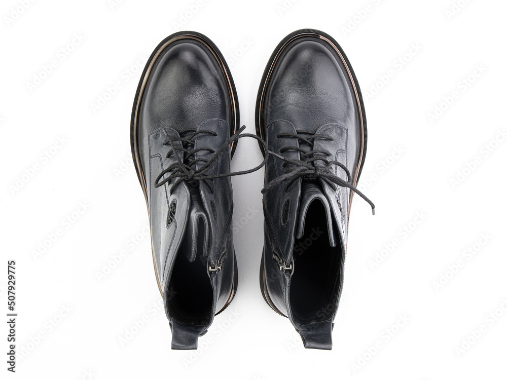 black leather jodhpur boots isolated on white background. Top view. Fashion shoes. Photoshoot for shoe shop concept.