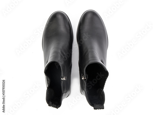 Obraz na płótnie black leather jodhpur boots isolated on white background. Top view. Fashion shoes. Photoshoot for shoe shop concept. w salonie