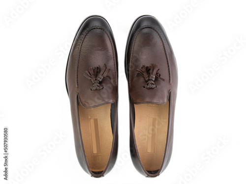 Obraz na płótnie Vintage Loafer Shoes. Closeup. Advertising shot. Concept closeup shoes. Isolated object close up on white background. Top view. w salonie