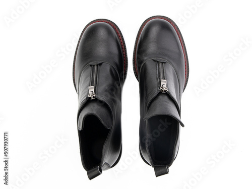 Obraz na płótnie black leather jodhpur boots isolated on white background. Top view. Fashion shoes. Photoshoot for shoe shop concept. w salonie