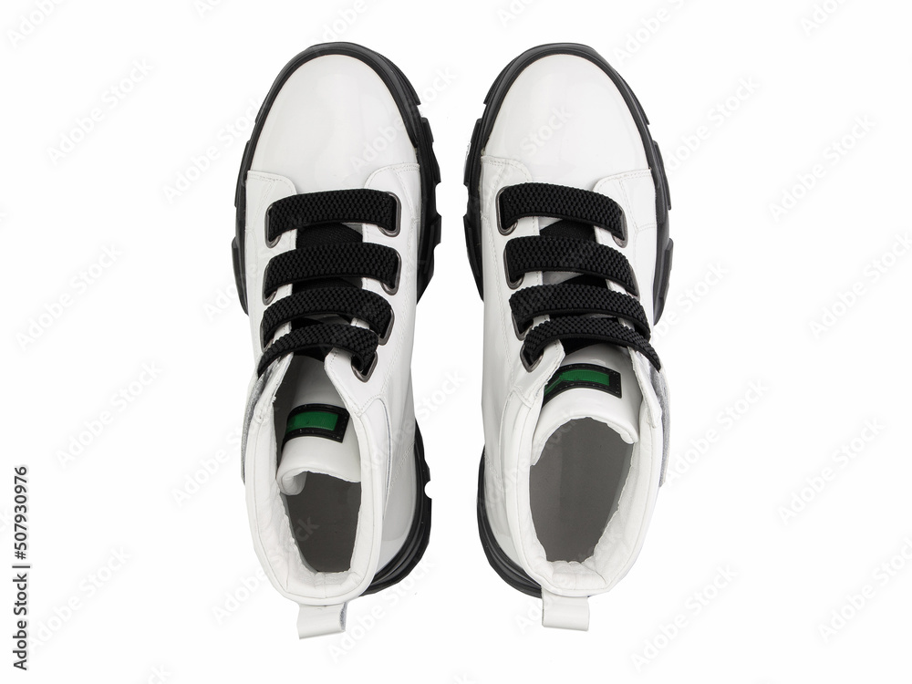 classic sneakers with laces. Casual style. Isolated close-up on white background. Top view. Fashion shoes