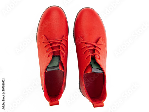 Obraz na płótnie jodhpur boots isolated on white background. Top view. Fashion shoes. Photoshoot for shoe shop concept. w salonie