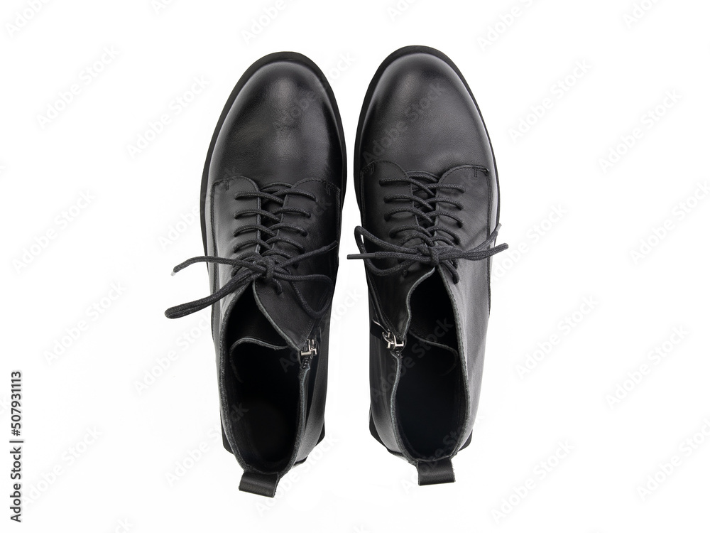 black leather jodhpur boots isolated on white background. Top view. Fashion shoes. Photoshoot for shoe shop concept.