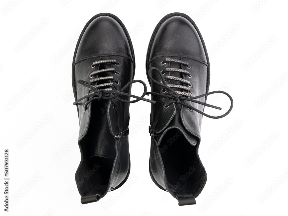 black leather jodhpur boots isolated on white background. Top view. Fashion shoes. Photoshoot for shoe shop concept.