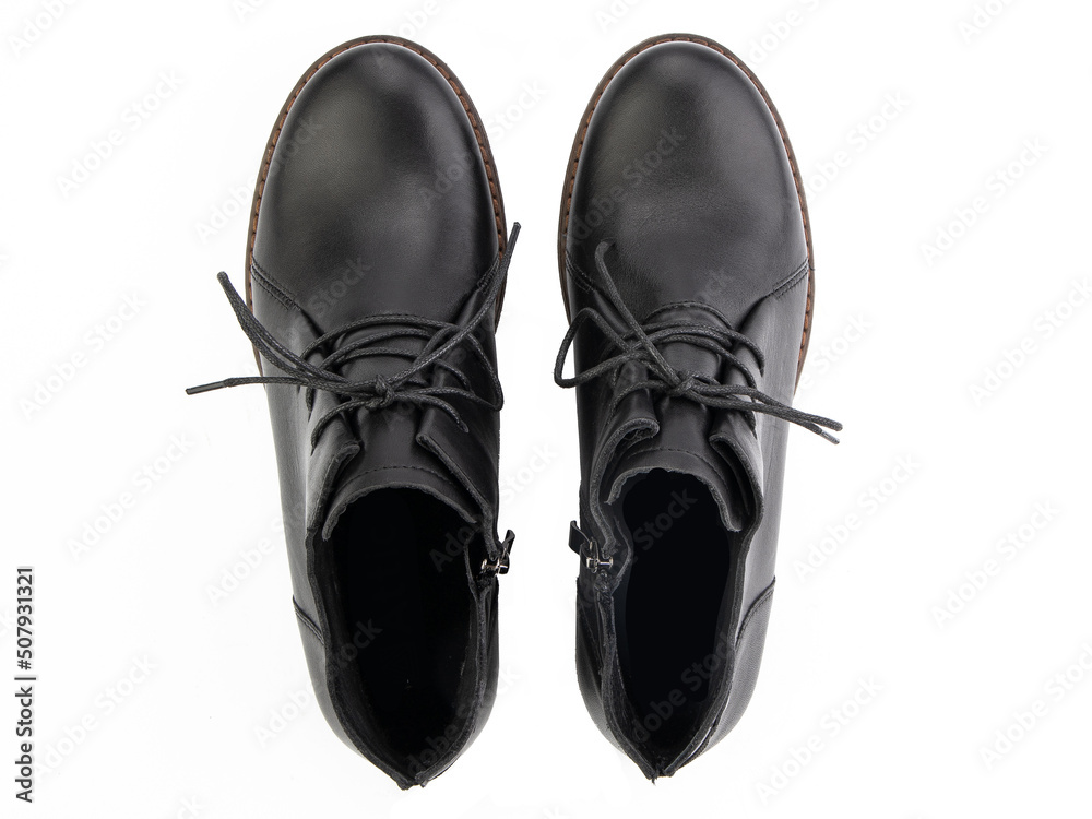 black leather jodhpur boots isolated on white background. Top view. Fashion shoes. Photoshoot for shoe shop concept.