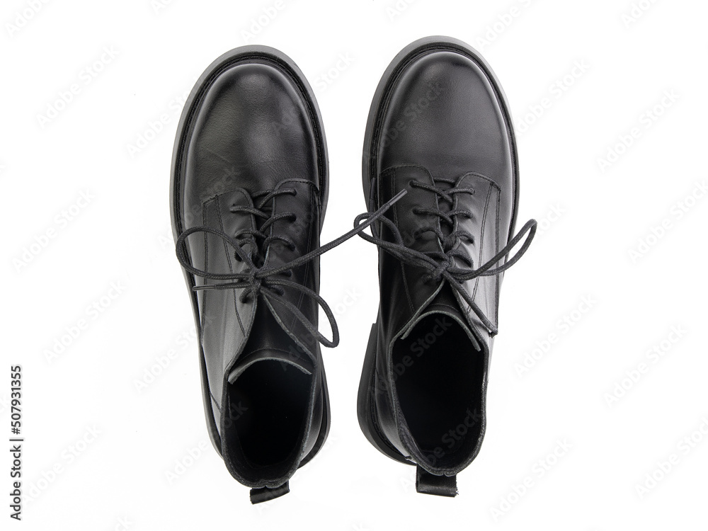 black leather jodhpur boots isolated on white background. Top view. Fashion shoes. Photoshoot for shoe shop concept.