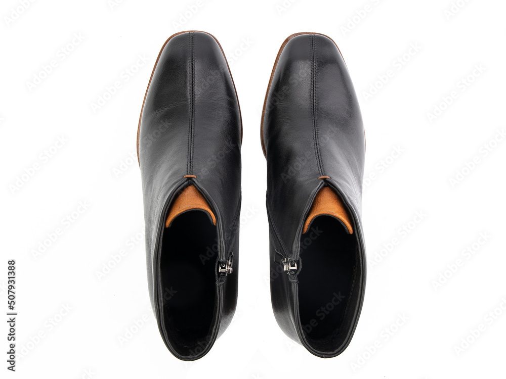 black leather jodhpur boots isolated on white background. Top view. Fashion shoes. Photoshoot for shoe shop concept.