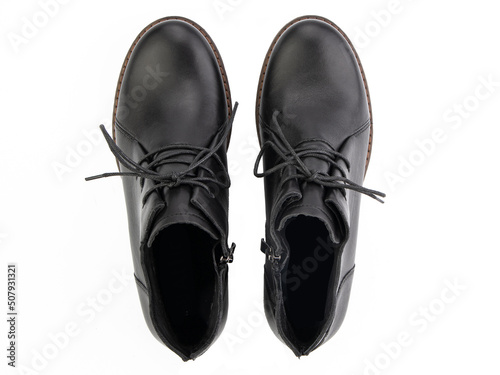 Obraz na płótnie black leather jodhpur boots isolated on white background. Top view. Fashion shoes. Photoshoot for shoe shop concept. w salonie