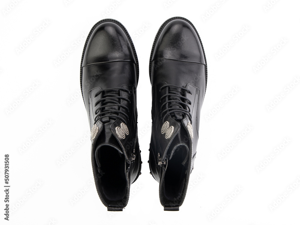 black leather jodhpur boots isolated on white background. Top view. Fashion shoes. Photoshoot for shoe shop concept.