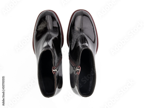 Obraz na płótnie black leather jodhpur boots isolated on white background. Top view. Fashion shoes. Photoshoot for shoe shop concept. w salonie