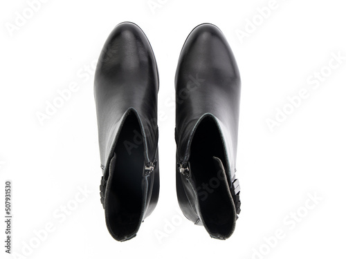 Obraz na płótnie black leather jodhpur boots isolated on white background. Top view. Fashion shoes. Photoshoot for shoe shop concept. w salonie