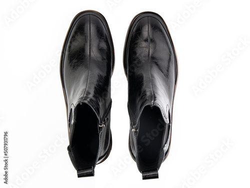 Obraz na płótnie black leather jodhpur boots isolated on white background. Top view. Fashion shoes. Photoshoot for shoe shop concept. w salonie