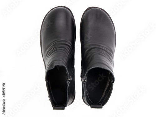 Obraz na płótnie black leather jodhpur boots isolated on white background. Top view. Fashion shoes. Photoshoot for shoe shop concept. w salonie