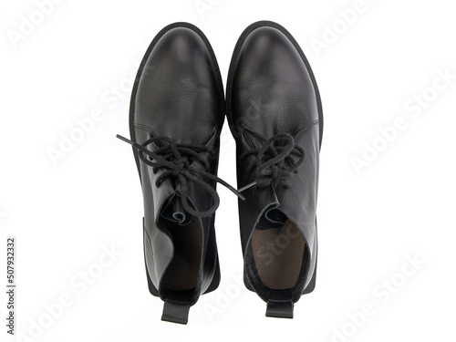 Obraz na płótnie A pair of classic leather elegant men's shoes isolated white background. Groom's stylish black shoes. Isolated object close up on white background. w salonie