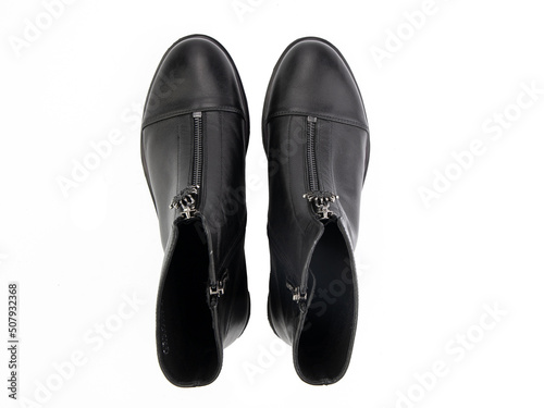 Obraz na płótnie black leather jodhpur boots isolated on white background. Top view. Fashion shoes. Photoshoot for shoe shop concept. w salonie