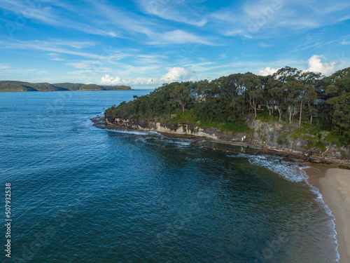 Aerial afternoon seascape with scattered high cloud