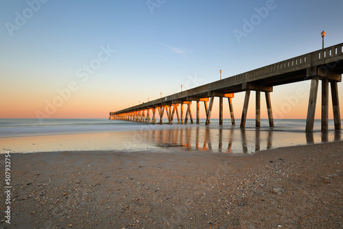 Beautiful  sunset over Jennette s Pier   Nags Head North Carolina. Originally built in 1939  Jennette   s is the oldest fishing pier on the Outer Banks  NC USA