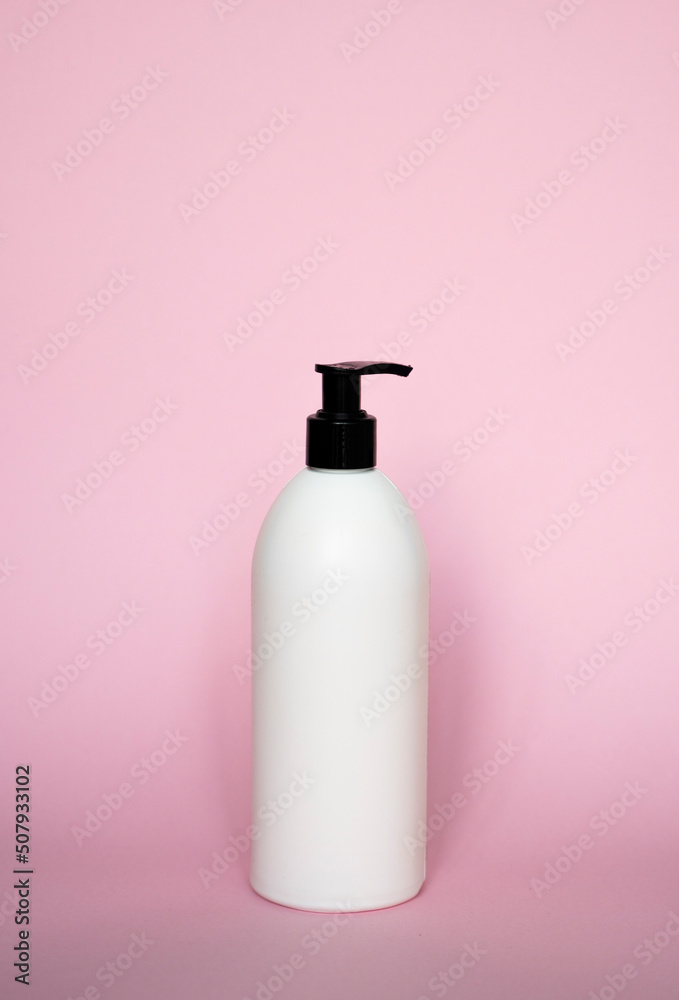 Liquid container for gel, lotion, cream, shampoo, bath foam on pink background. Cosmetic plastic bottle with white dispenser pump. Mock up template for design. Liquid container for gel, lotion, cream, shampoo, bath foam on pink background. Cosmetic plastic bottle with white dispenser pump. Mock up template for design.