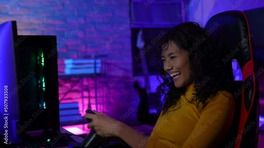 Holiday concept of 4k Resolution. Asian woman playing games in the living room.