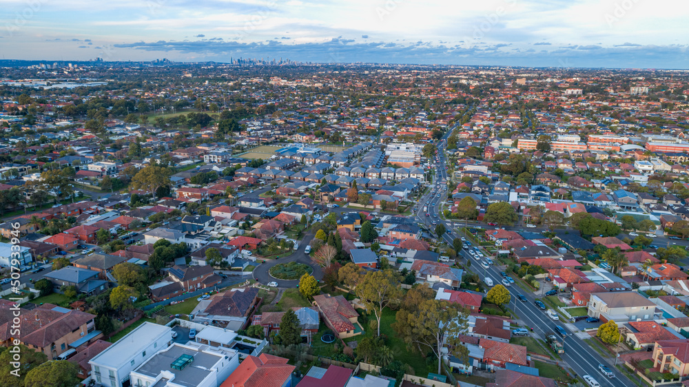 Aerial drone photo of a residential neighbourhood in Sydney Australia at sunset