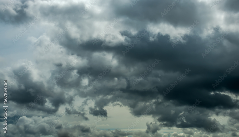 Fototapeta premium May sky with rainy black and gray clouds