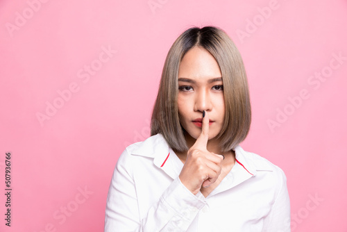Shh shy sly people person modern concept. Close up portrait of cute lovely attractive uncertain unsure with stylish hairdo entrepreneur making hush gesture isolated on pink background