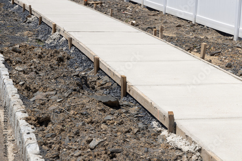 new concrete footpath sidewalk cement street material gray gravel urban walkway photo