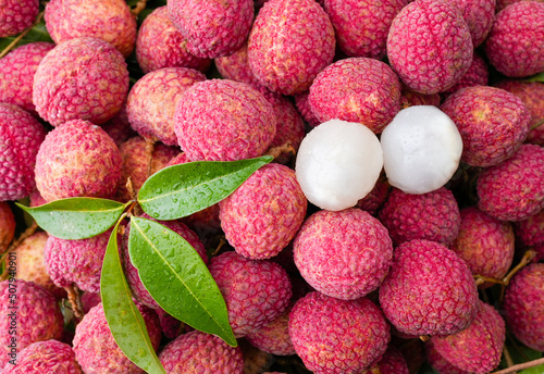 Pile Lychee Fruit With Little Leaf For Background. Summer Fruit Background.
