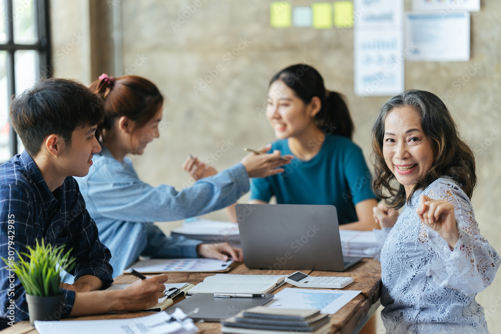 ฺBusinesswoman leaders in office meeting room, Group of a young business people discussing business plan at modern startup office building. ฺBusinesswoman leaders in office meeting room, Group of a young business people discussing business plan at modern startup office building.