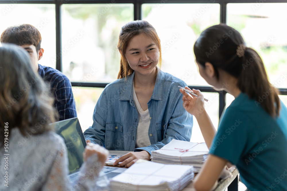 ฺBusinesswoman leaders in office meeting room, Group of a young business people discussing business plan at modern startup office building. ฺBusinesswoman leaders in office meeting room, Group of a young business people discussing business plan at modern startup office building.