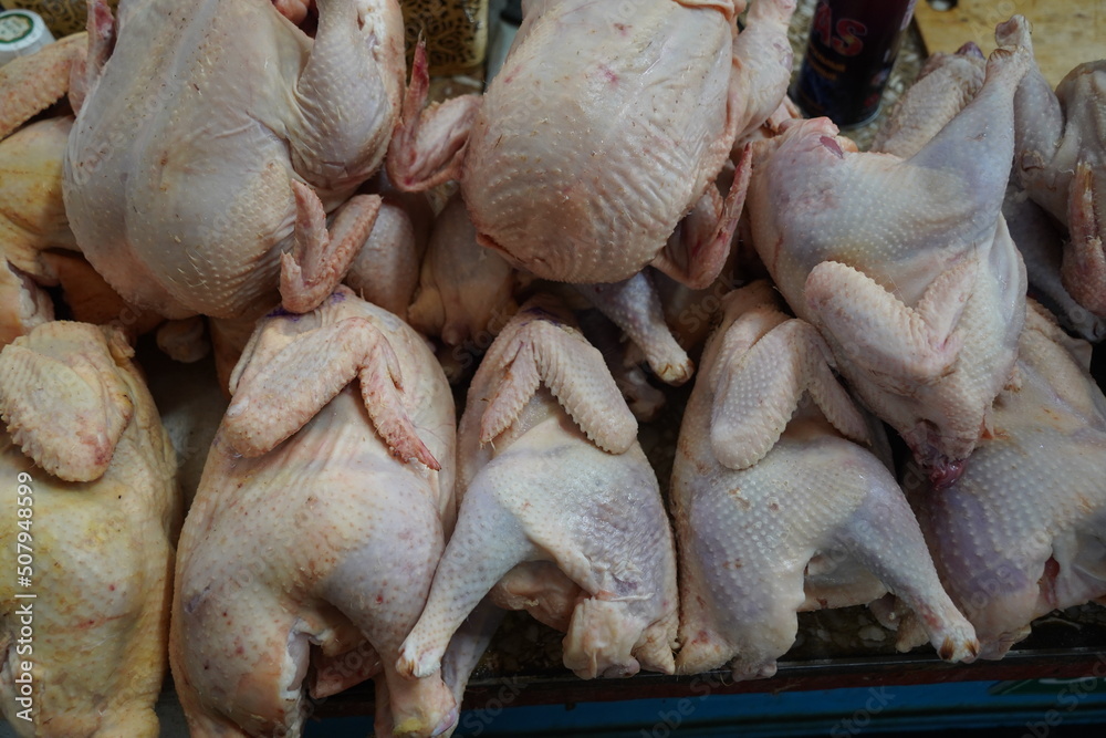 Almaty, Kazakhstan - 03.25.2022 : Sale of chicken meat on the open market Almaty, Kazakhstan - 03.25.2022 : Sale of chicken meat on the open market