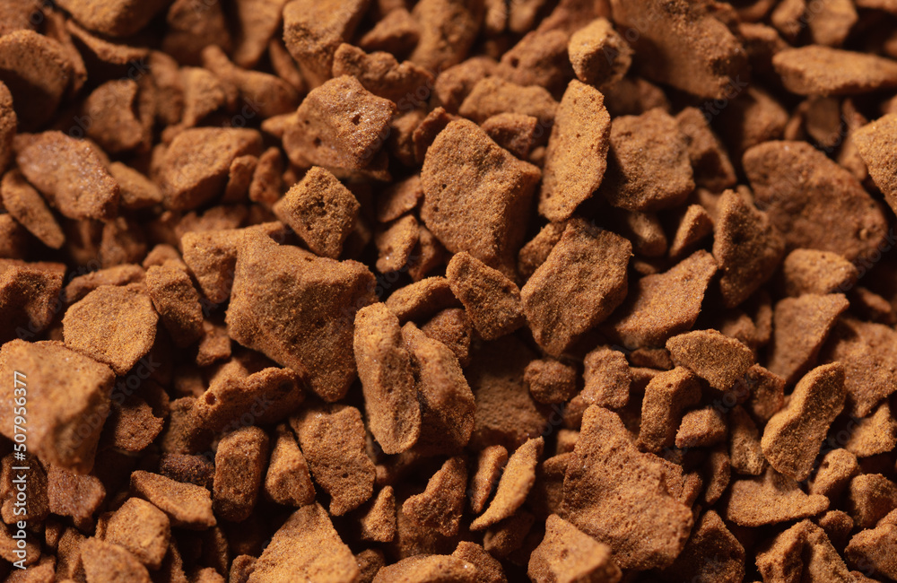 Instant coffee granules as background. Instant coffee granules as background.