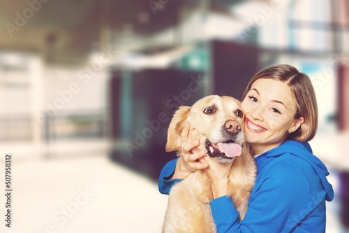 Young woman resting with pet at home. Morning sleep time at home.