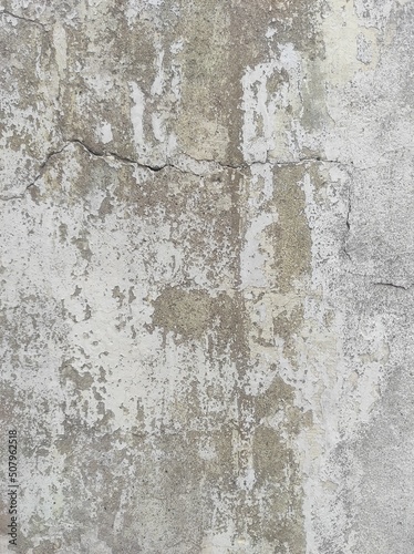 Texture of old concrete wall.Concrete wall of light grey color cement texture background.Grey pastel rough crack cement texture stone concrete,rock plastered stucco wall; painted flat fade background.