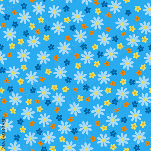 Cute floral Ditsy fashion trend pattern with small delicate flowers isolated on a blue background