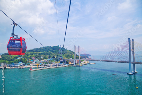 Yeosu Maritime Cable Car is the first of its kind in Korea, connecting Dolsan Island and the mainland over the ocean. photo