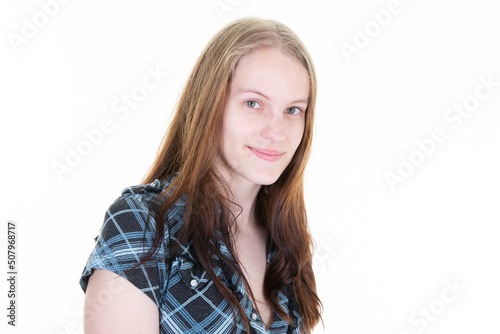 cute cheerful young woman portrait smiling aside copy space on white background bonde girl and blue eyes