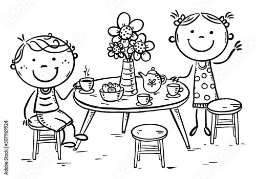 Boy and girl drinking tea, kids at the table
