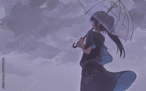 傘をさして外を歩いている女の人