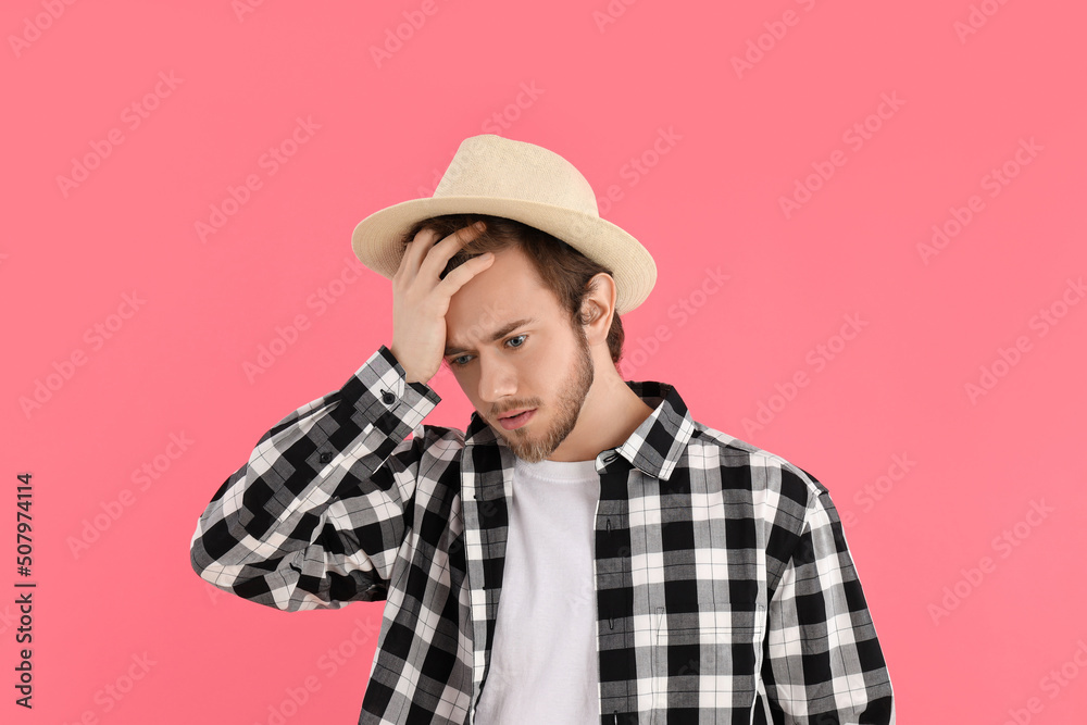 Concept of people, young man on pink background Concept of people, young man on pink background