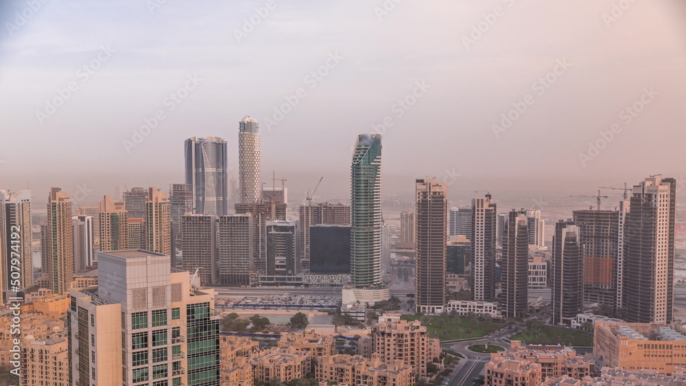 Obraz premium Aerial panoramic skyline of a big futuristic city timelapse. Business bay and Downtown