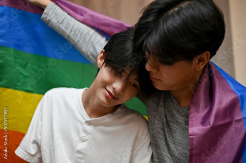 Romantic asian teenage gay men couple, a man put his head on his boyfriend shoulder