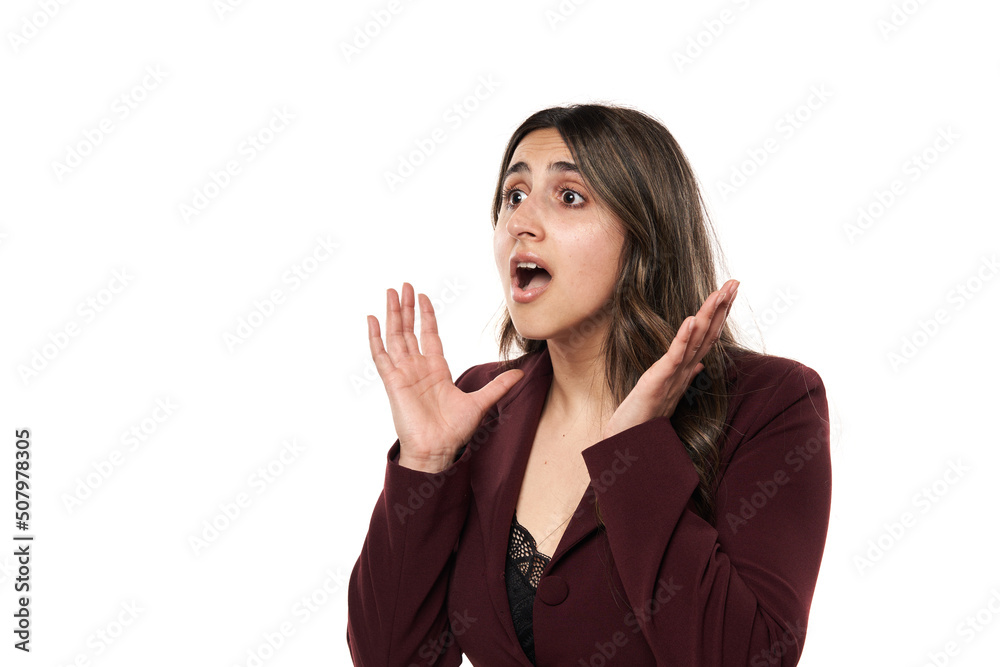 Indian businesswoman with shock expression, on white Indian businesswoman with shock expression, on white