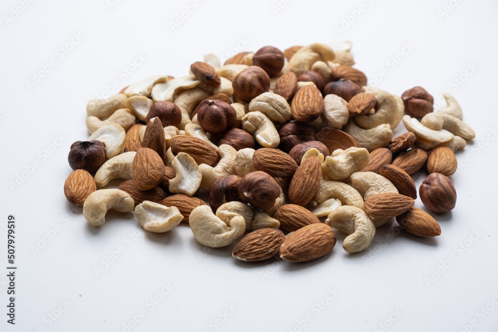 Various nuts on a white background close-up.