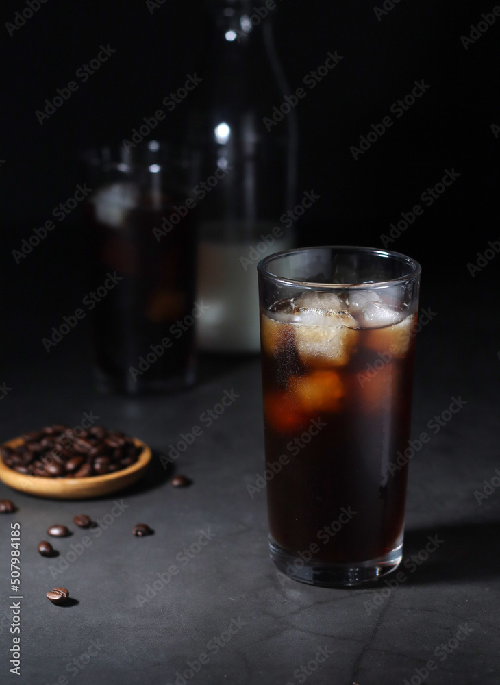 Cold coffee with ice in low key Cold coffee with ice in low key