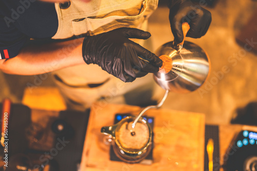 Asian hipster barista worki...