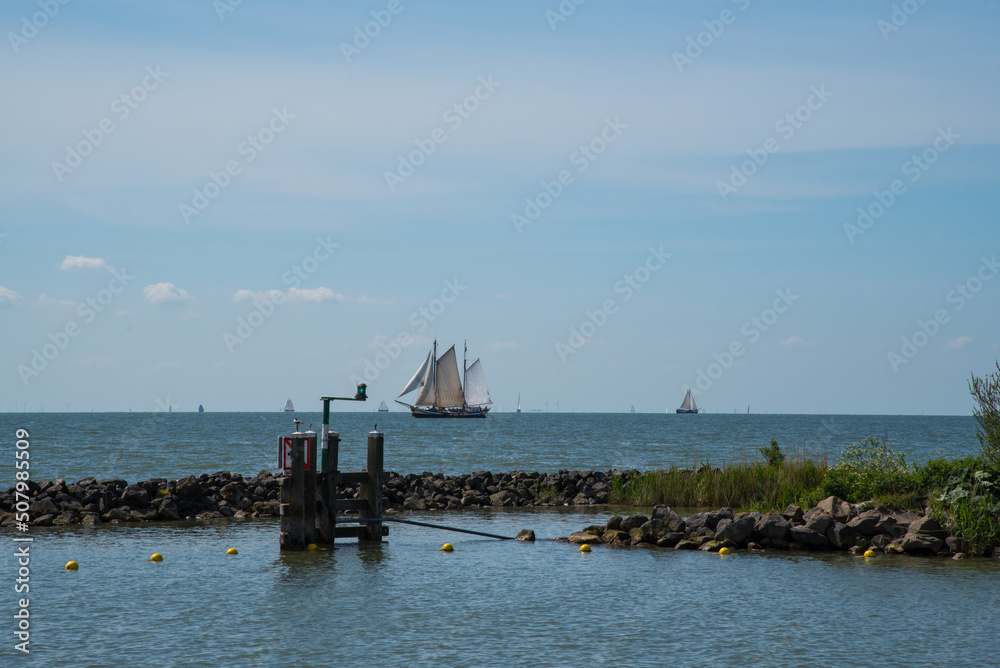 Oosterleek, Netherlands, May 2022. Old traditional sailing ships on the Markermeer, Netherlands.